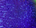 Modern tech. Minificated web development javascript code close up in sunset rays. Computer programming source code. Programming Royalty Free Stock Photo