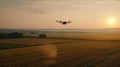 Modern technologies in agriculture. Industrial drone flies over a green field and sprays