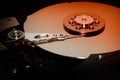 Modern technologies background with hard disk. Red Light. Royalty Free Stock Photo