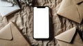 Modern technologies and old traditions. Phone mockup. A white-screen phone is on the table next to a stack of mail envelopes. Top Royalty Free Stock Photo