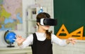 Modern technologies. virtual reality headset. teenage schoolgirl in classroom. back to school. In a Computer Science Royalty Free Stock Photo