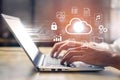 Modern technology concept showcasing cloud computing and data security with laptop and creative holographic icons Royalty Free Stock Photo