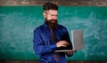 Modern technology education. Digital technology education. Start lesson. Teacher bearded man with modern laptop