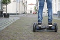 Modern technology, a man is riding on a blackboard. Close Up of Dual Wheel Self Balancing Electric Skateboard Smart. on electrical Royalty Free Stock Photo