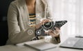 Modern technology and networking concept, woman using laptop, tablet and smartphone with virtual screen API icon Software Royalty Free Stock Photo