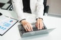 Modern technology and networking concept, woman using laptop, tablet and smartphone with virtual screen API icon Software Royalty Free Stock Photo