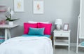Modern teenager`s room interior with comfortable bed and workplace Royalty Free Stock Photo