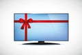 Modern television packed as a gift with red bow Royalty Free Stock Photo