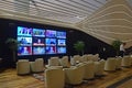 Modern television rest relaxing sofa area, Turkish Airlines Business First Executive Class lounge new Istanbul airport Turkey Royalty Free Stock Photo