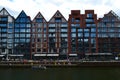 Modern tenement houses on the Motlawa River, Gdansk, Poland. Royalty Free Stock Photo