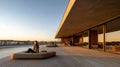 Modern terrace overlooking river at sunset Royalty Free Stock Photo