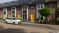 Modern Terraced houses with solar panels on the roof of rental houses. Photovoltaic panels on the roof. Royalty Free Stock Photo