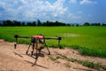 Modern Thai farmers use drones to spray chemicals Above the rice fields