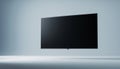 Modern Thin Bezel LED TV Full Object with Floating Look on Soft Plain Background Royalty Free Stock Photo