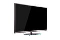 Modern thin plasma LCD TV on a silver black glass stand isolated Royalty Free Stock Photo