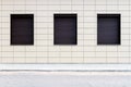 Modern tile wall with some windows Royalty Free Stock Photo