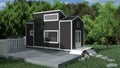 Modern tiny house with green grass and concrete floor Royalty Free Stock Photo