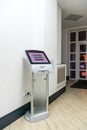 A modern touch screen terminal for customer service, an electronic queue in the service sector. Using a self-service kiosk or a