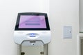 A modern touch screen terminal for customer service, an electronic queue in the service sector. Using a self-service kiosk or a