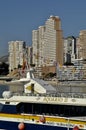 Benidorm Poniente beach and touristic tour boat in the harbor