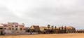 Modern touristic cottages of Dolfynstrand resort at the seaside, close to Walvis Bay, Namibia