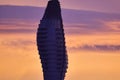 Modern tower building at sunset with vibrant sky Royalty Free Stock Photo