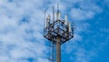 Modern tower 5 g on the background of a cloudy sky. Telecommunication antenna. Repeater. Communication tower. Estonia. Royalty Free Stock Photo