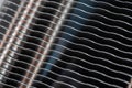 Modern tower heat radiator closeup macro background with selective focus and diagonal composition Royalty Free Stock Photo
