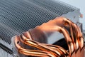 Modern tower heat radiator with six copper heatpipes closeup macro background. Selective focus diagonal composition Royalty Free Stock Photo