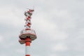 Modern tower, lighthouse radar a cloudy sky. Royalty Free Stock Photo