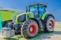 Modern tractor for agriculture on the farm with a powerful motor