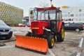 Modern tractor for cleaning streets parked