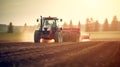 Modern tractor working on the farm, tillage in spring, preparation for sowing in the field under sunset light. generative ai Royalty Free Stock Photo