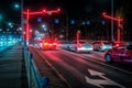 Modern traffic light in night city. Red stop light