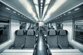 Modern train coach interior view. Royalty Free Stock Photo