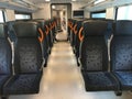 Modern train interior featuring spacious seating and minimalist design for comfortable travel Royalty Free Stock Photo