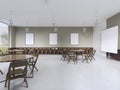 Modern training room with brown furniture and olive walls