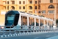 modern tram with an automated control system runs on rails in the city center. The concept of eco-friendly public transport of Royalty Free Stock Photo