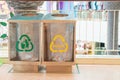 Modern transparent containers with signs for separate garbage waste in the mall. Waste separate collection system.