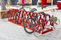 Modern transport concept. Original bicycle parking decorated with flowers Royalty Free Stock Photo