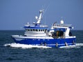 Modern Trawler Underway at Sea. Royalty Free Stock Photo