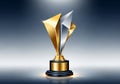 A modern trophy with abstract geometric shapes in gold and Royalty Free Stock Photo