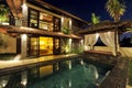 Modern tropical villa with swimming pool Royalty Free Stock Photo