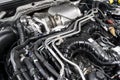 Modern turbo diesel car engine under vehicle hood. Car engine background. Car engine part. Modern powerful engine