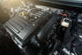 Modern turbocharged eco-friendly engine or motor under vehicle hood close up