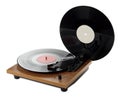 Modern turntable with vinyl records on white background