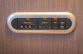 Modern TV audio video input panel on wall .