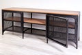 Modern TV stand with metal frame and wooden shelves