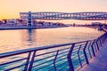 Modern twisted bridge over the Dubai Water Canal in United Arab Emirates at sunset