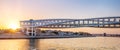 Modern twisted bridge over the Dubai Water Canal in United Arab Emirates at sunset Royalty Free Stock Photo